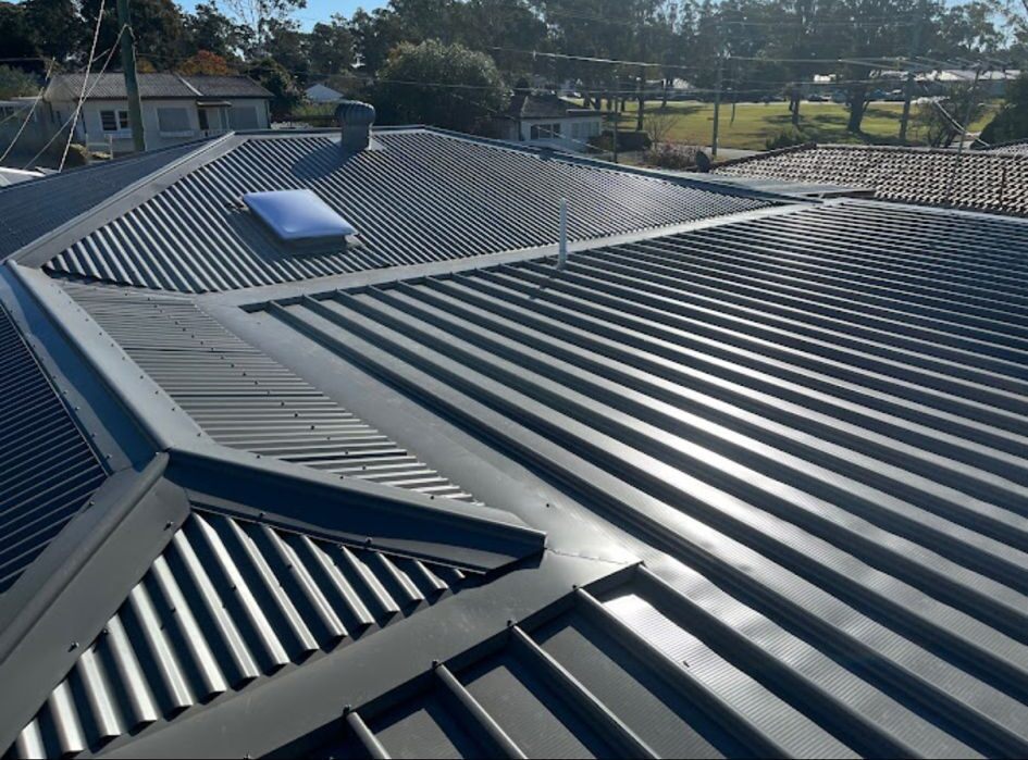 Dark corrugated metal roof after a full restoration